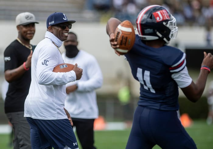 Jackson State University head football coach Deion Sanders and his team get ready for their game against Mississippi Valley State at Veterans Memorial Stadium in Jackson, Miss., Sunday, March 14, 2021. Sdw 2972